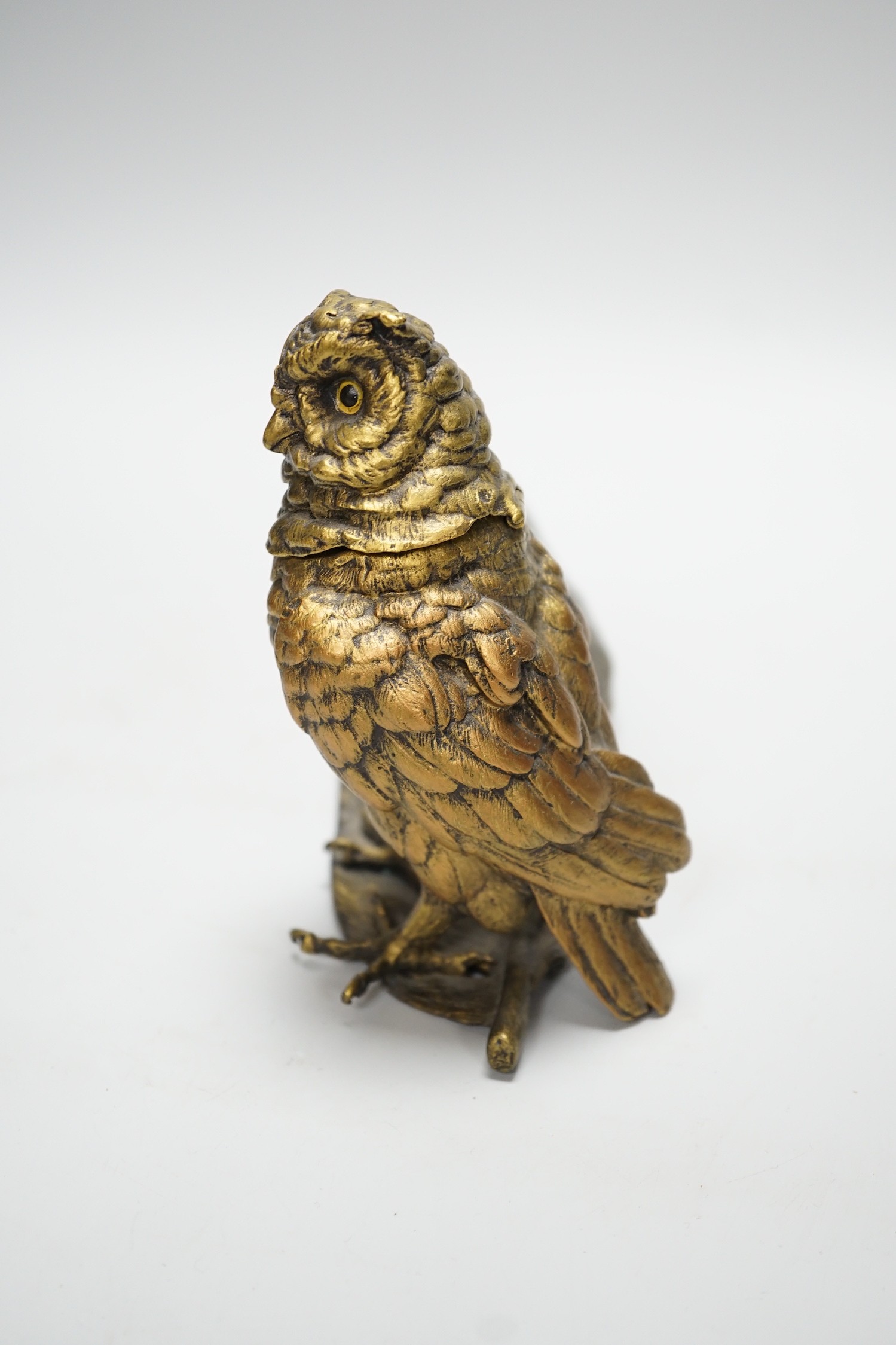 A bronze ‘owl and a feather’ inkwell with Bergman mark, 34cm long
